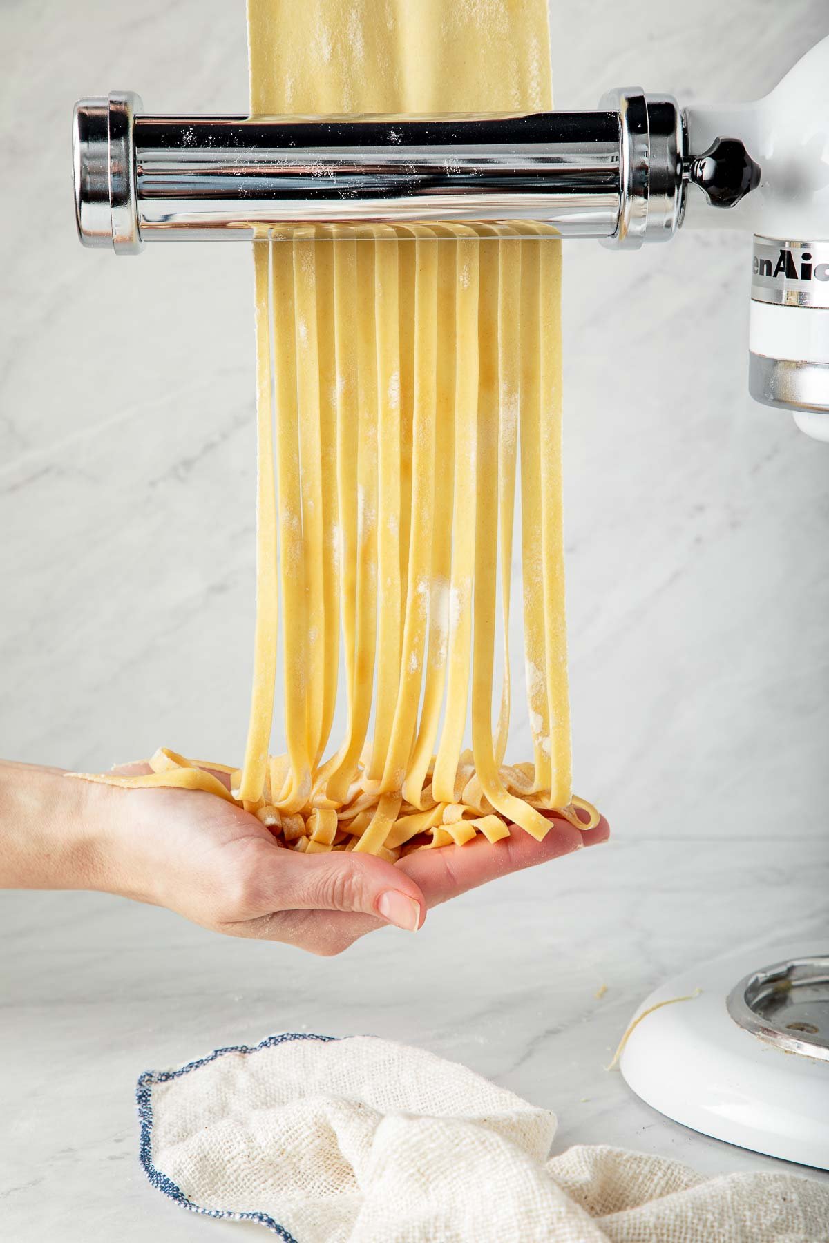 making homemade pasta with pasta cutter. 