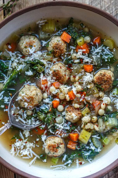 This Italian wedding soup is a cozy classic made with tender meatballs, delicate pasta, kale, and a rich, savory broth full of Italian flavor.