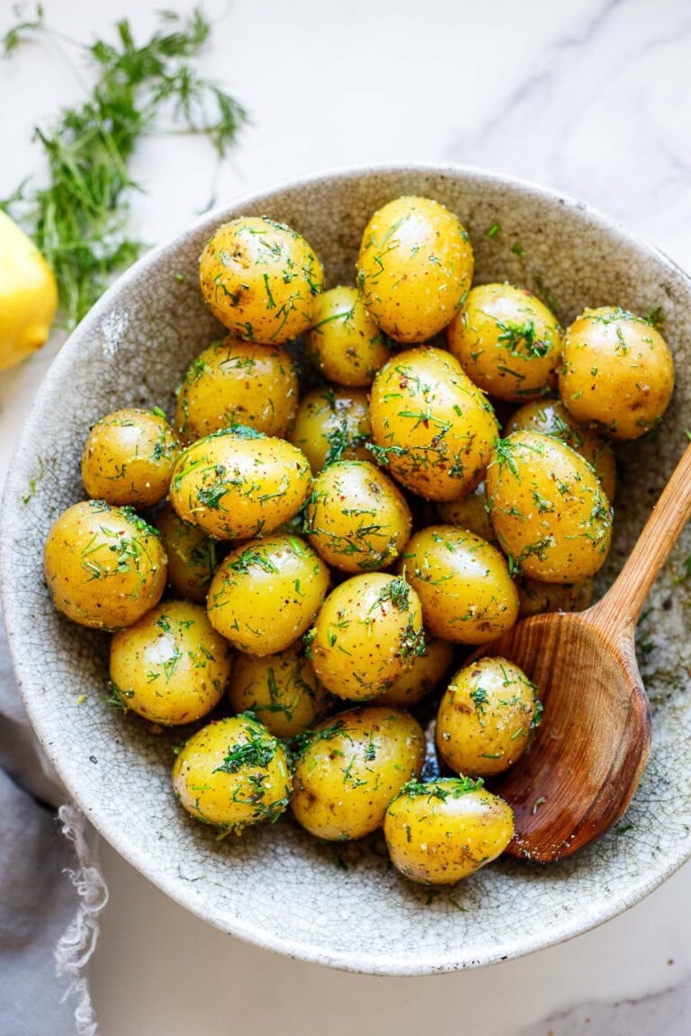 Finnish boiled potatoes with dill — a simple, traditional side dish made with tender new potatoes, fresh herbs, olive oil, and lemon.