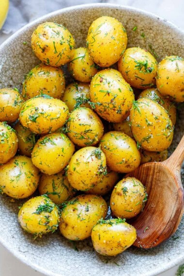 Finnish boiled potatoes with dill — a simple, traditional side dish made with tender new potatoes, fresh herbs, olive oil, and lemon.