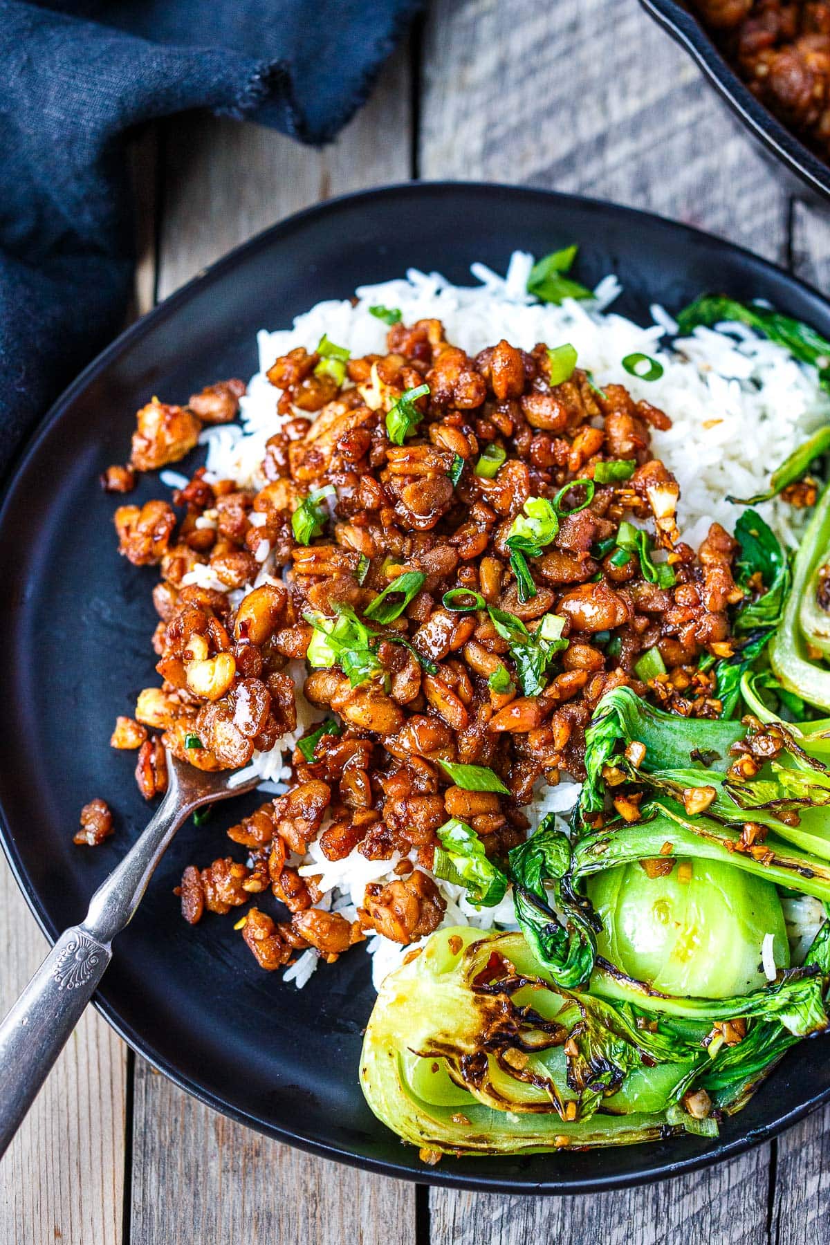 This sticky crumbled tempeh recipe is fast, easy, and full of delicious savory flavor. A quick weeknight dinner, full of healthy plant protein. Vegan.