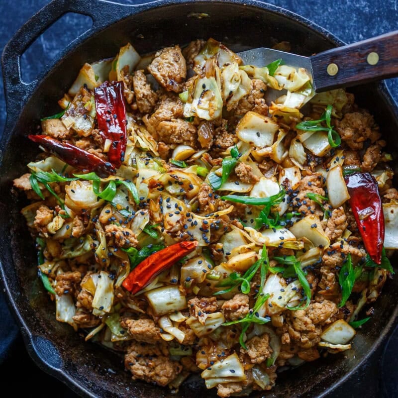 This Chicken Cabbage Stir-Fry is simple, bold, and seriously satisfying! Delicious on its own or spooned over rice or rice noodles, it's a quick, easy weeknight dinner.