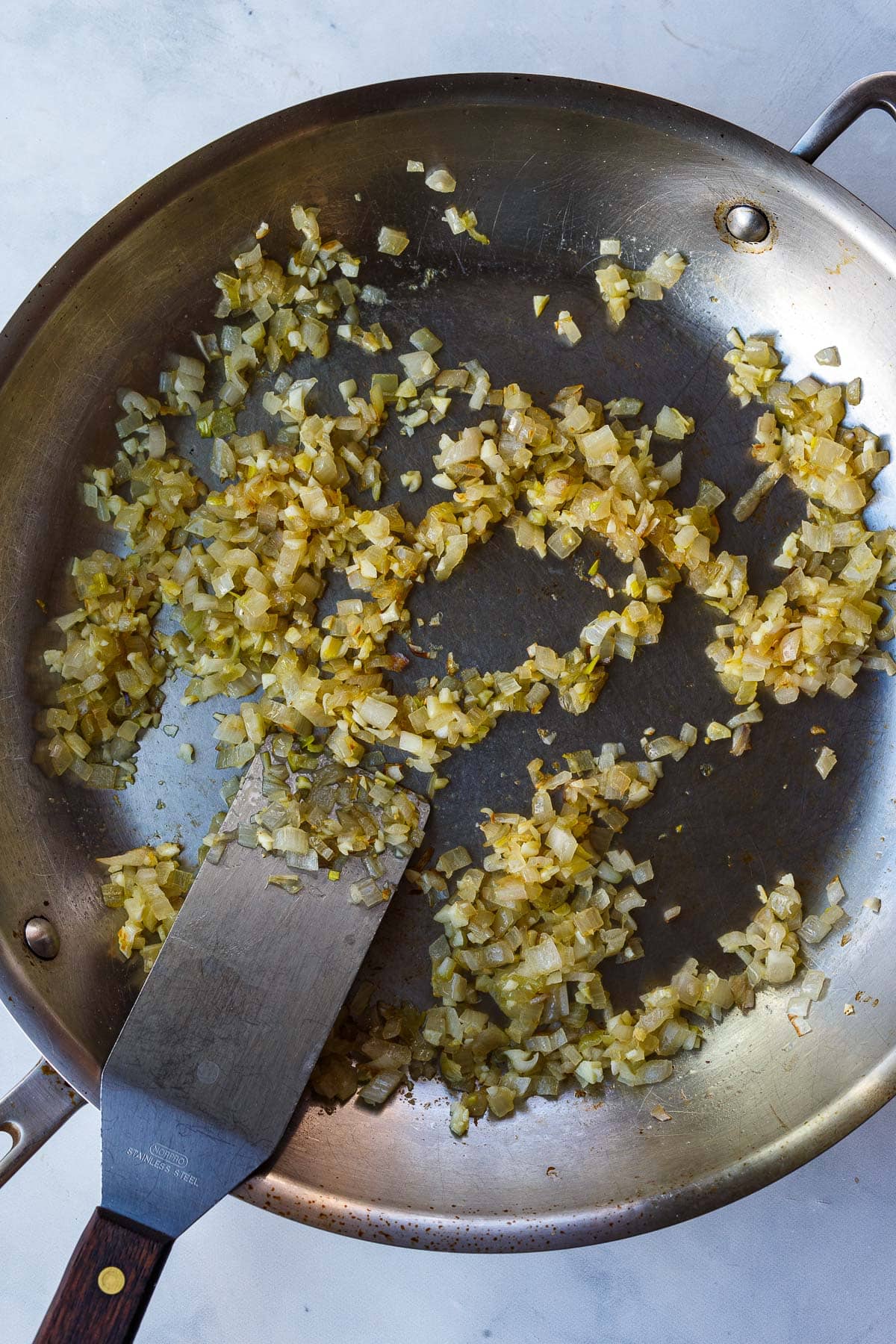 skillet with sautéed onions, garlic and ginger.