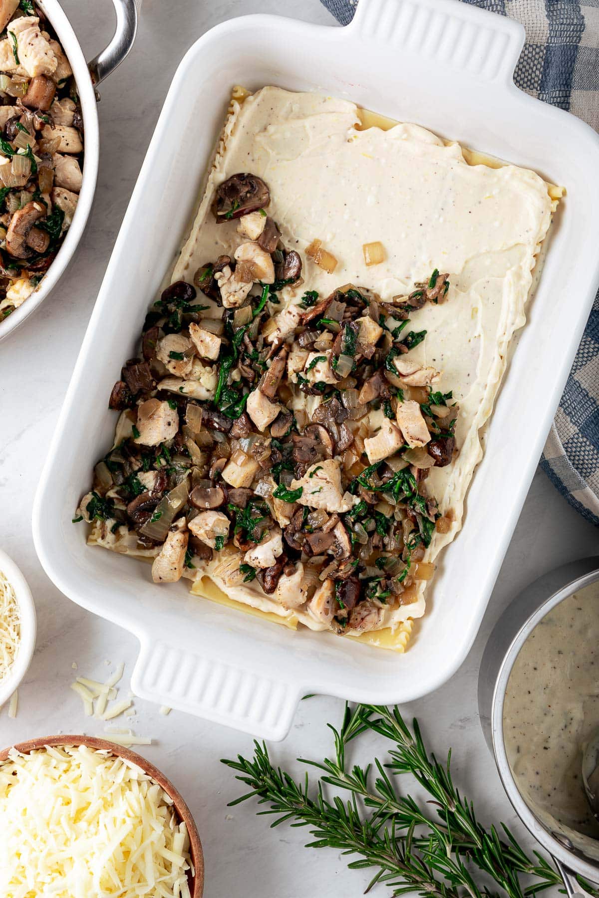 Layering the lasagna.