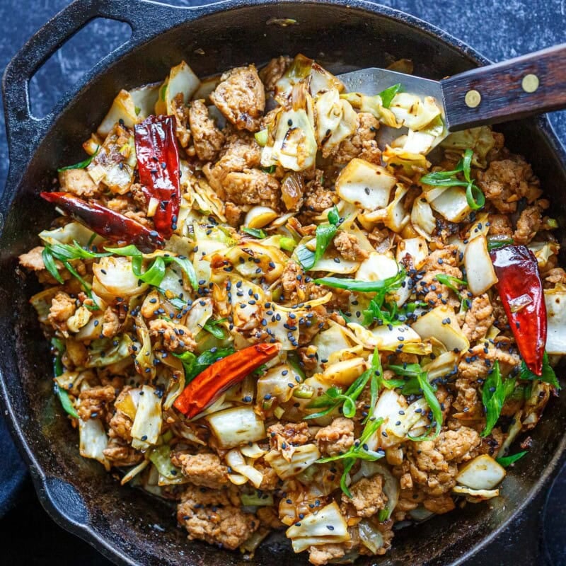 This Chicken Cabbage Stir-Fry is simple, bold, and seriously satisfying! Delicious on its own or spooned over rice or rice noodles, it's a quick, easy weeknight dinner.