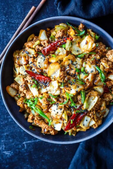 This Chicken Cabbage Stir-Fry is simple, bold, and seriously satisfying! Delicious on its own or spooned over rice or rice noodles, it's a quick, easy weeknight dinner.