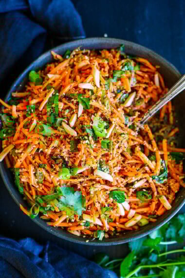 This Asian Carrot Salad is crunchy and refreshing, and pairs well with many things. It's vegan and gluten-free, and it's a nice side dish to the meals and bowls you are already making. Vegan.