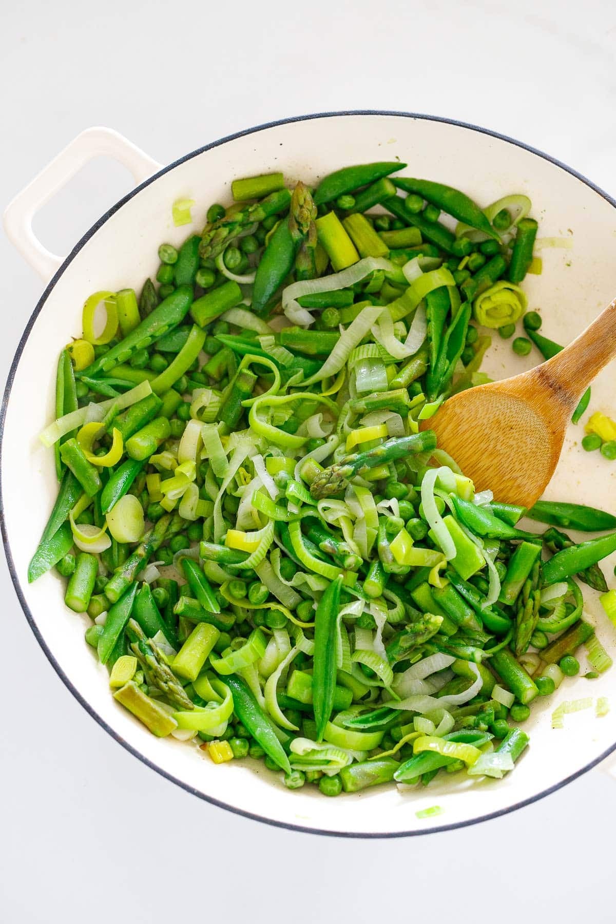 sauteing fresh vegetables in a skillet. 