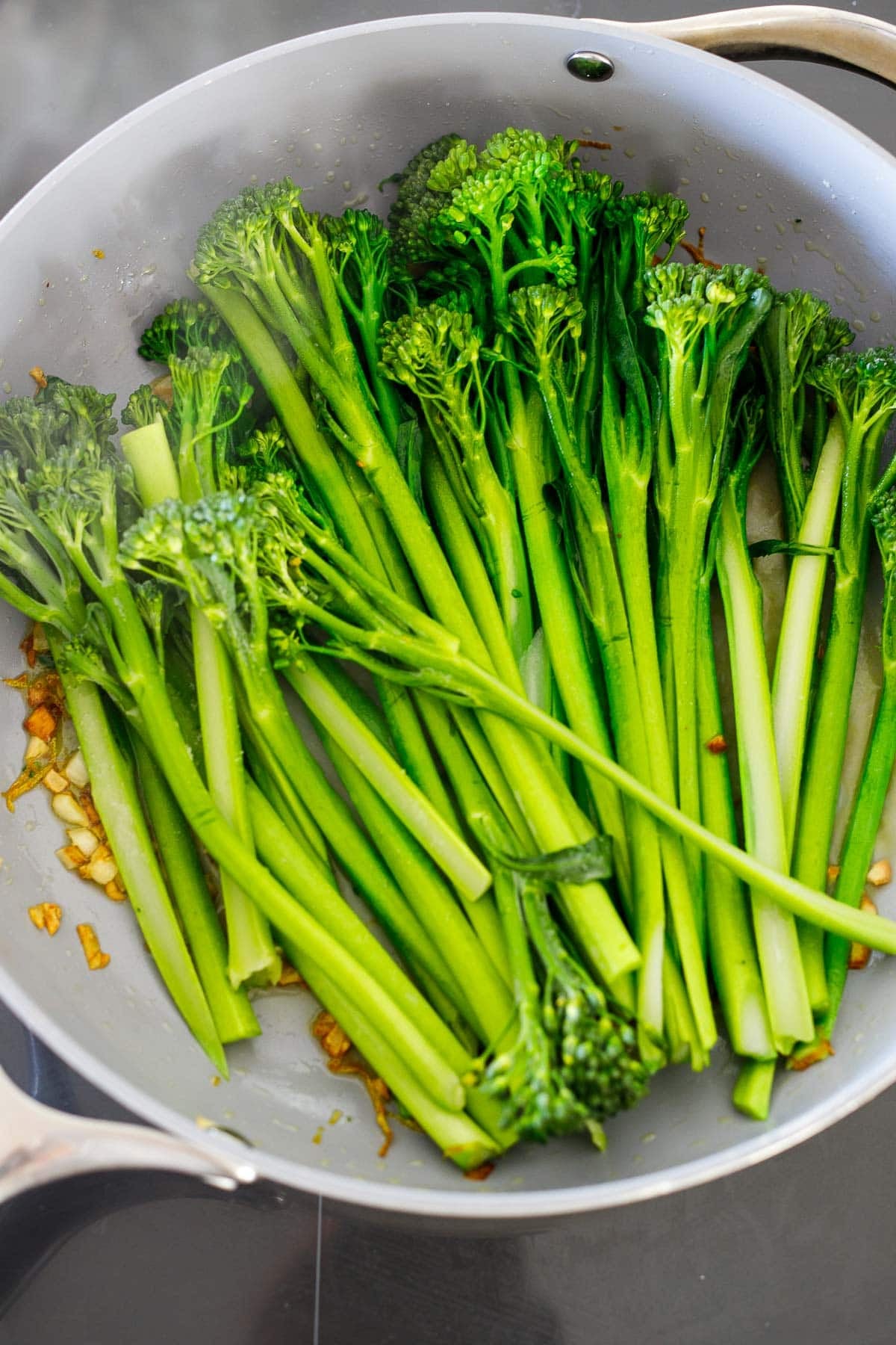 broccolini in sauté pan. 