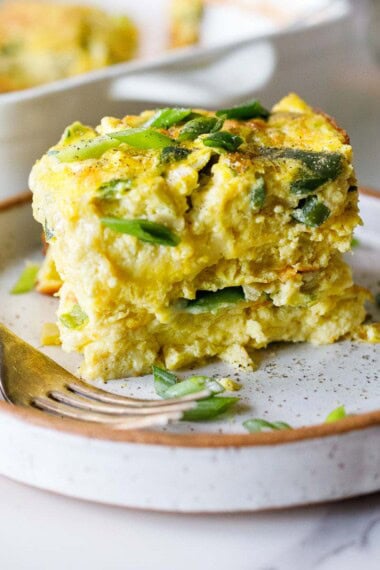 This make-ahead breakfast casserole is fluffy, cheesy, and packed with protein. Perfect for busy mornings, holiday brunch, or feeding a crowd. A delicious, healthy breakfast idea, or serve it for lunch! Keto, Vegetarian, Low carb.