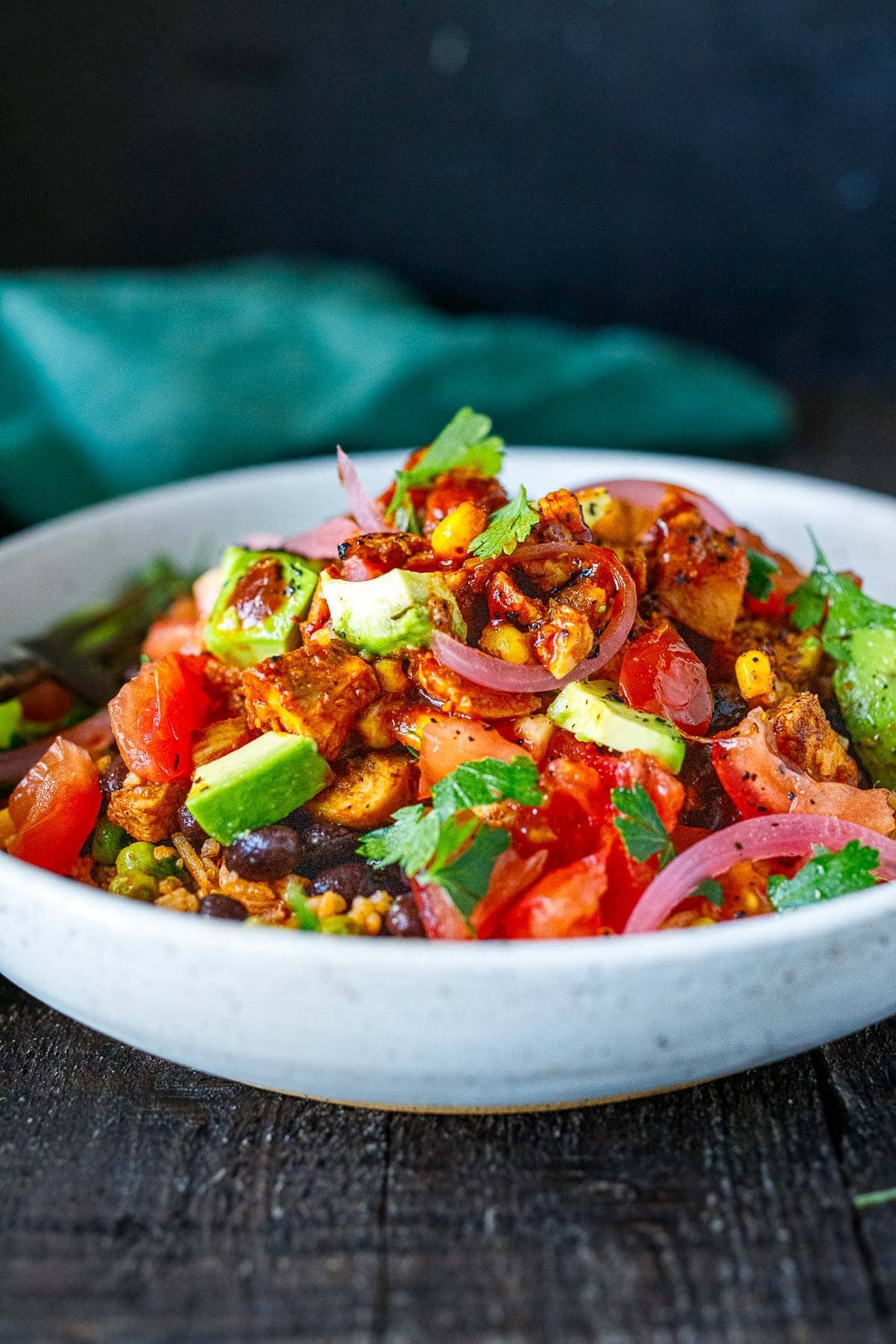 A homemade chipotle burrito bowl with chicken.