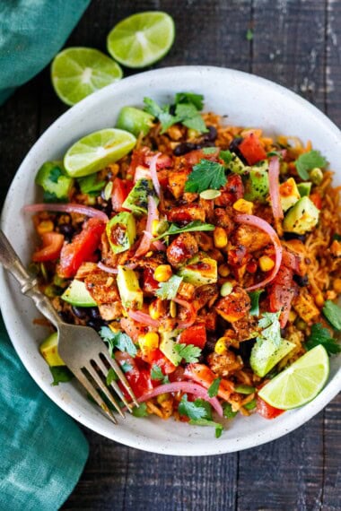 These Chipotle Burrito Bowls are smoky, bold, and easy to customize with chipotle chicken, rice, beans, and fresh toppings-perfect for a healthy, flavor-packed meal, anytime of day.
