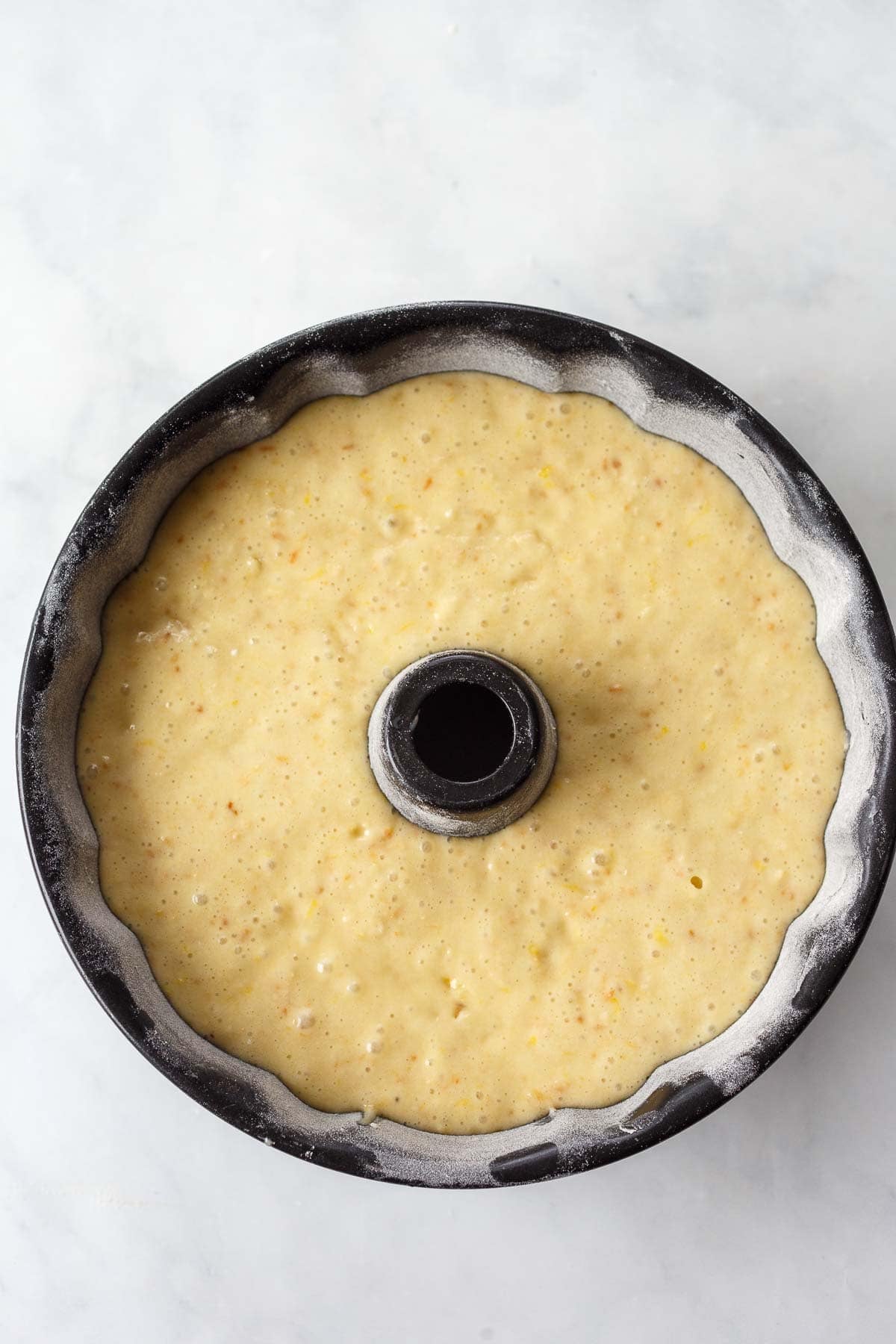 lemon bundt cake batter in bundt pan.