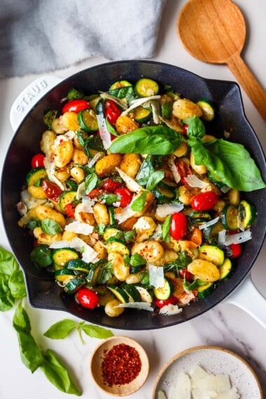 Crispy pan-fried gnocchi with zucchini, cherry tomatoes, basil, and pecorino cheese-all cooked in one pan in just 20 minutes. Golden on the outside, tender inside, and easily vegan- or gluten-free-adaptable.