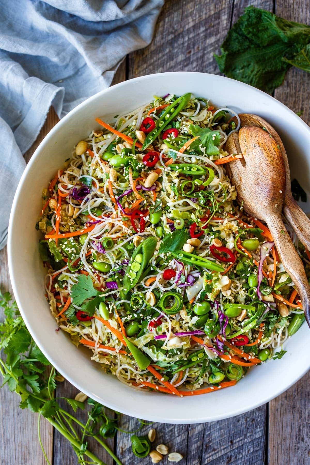 This Asian noodle salad is a fresh, crunchy dish made with rice noodles, cabbage, colorful vegetables, and a tangy sesame-ginger dressing. The perfect side dish for summer gatherings, BBQ’s, or meal prep.