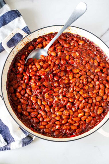 These homemade baked beans are smoky, savory, and easy to make with BBQ sauce, paprika, and tender beans (use dry or canned). The perfect vegan BBQ side dish.