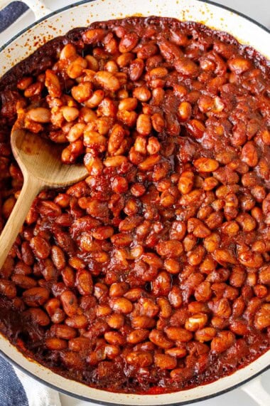These homemade baked beans are smoky, savory, and easy to make with BBQ sauce, paprika, and tender beans (dry or canned). The perfect vegan BBQ side dish.
