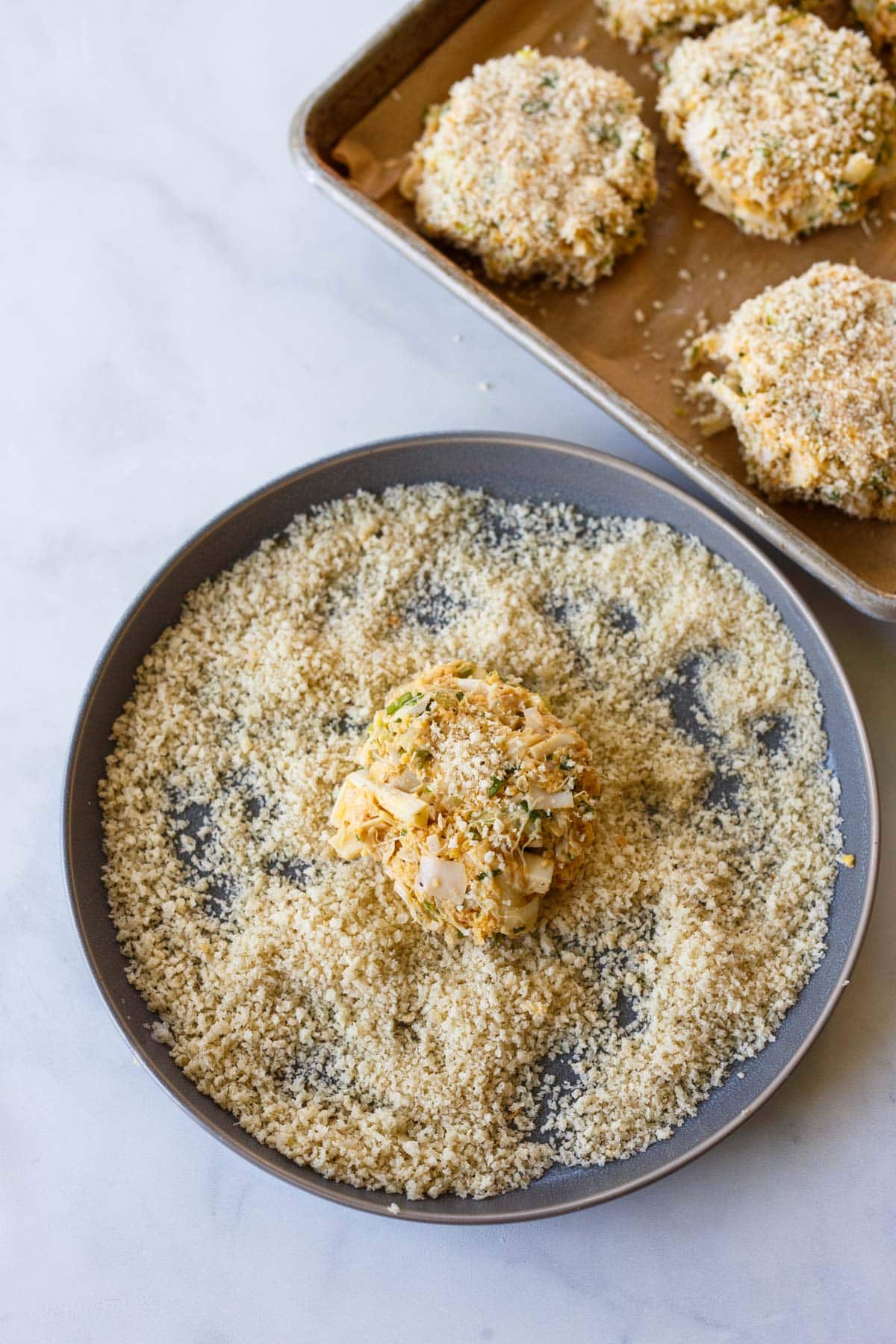 vegetarian crab cake coated in panko on a plate.