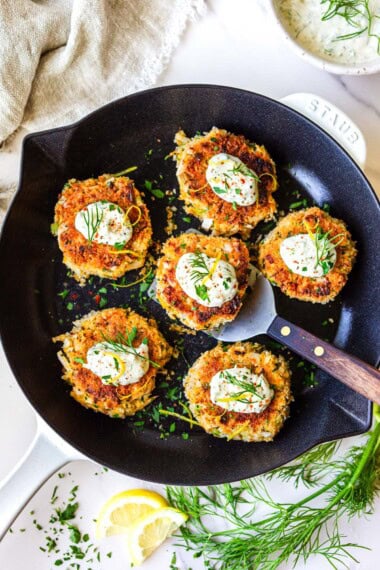 These crispy hearts-of-palm "crab" cakes are a delicious vegetarian appetizer inspired by classic crab cakes. Flaky, savory, and served with a bright lemon-dill sauce, they're perfect for entertaining or a light meal. Gluten-free adaptable.