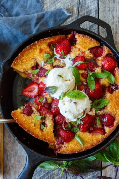 This easy Strawberry Cobbler is the ultimate summer dessert! Juicy fresh strawberries bake beneath a tender, buttery crust until golden and bubbly. Serve it warm with a scoop of vanilla ice cream.