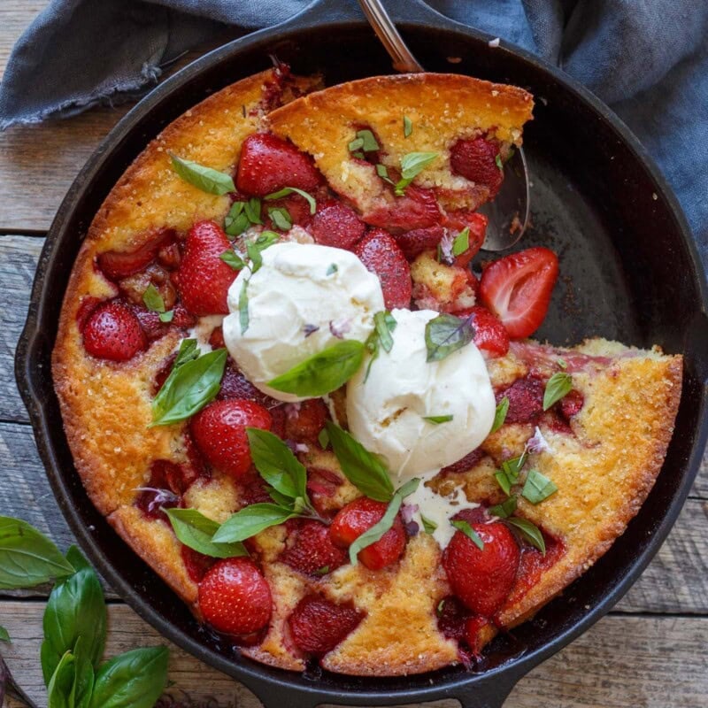 This easy Strawberry Cobbler is the ultimate summer dessert! Juicy fresh strawberries bake beneath a tender, buttery crust until golden and bubbly. Serve it warm with a scoop of vanilla ice cream.