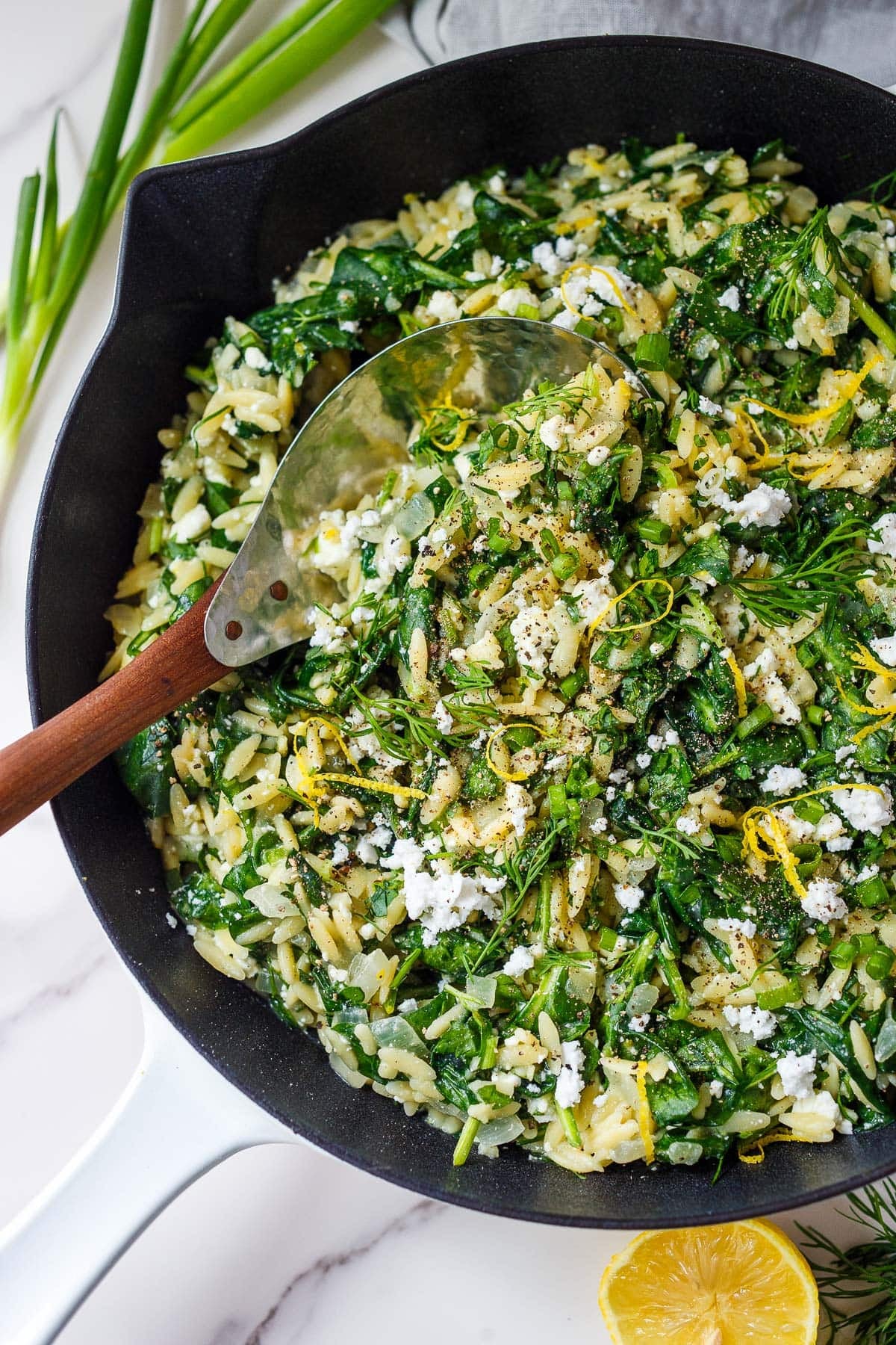 This easy Spanakopita Orzo is a creamy one-pan dinner with spinach, feta, fresh dill, and lemon. All the flavors of spanakopita, ready in about 30 minutes!