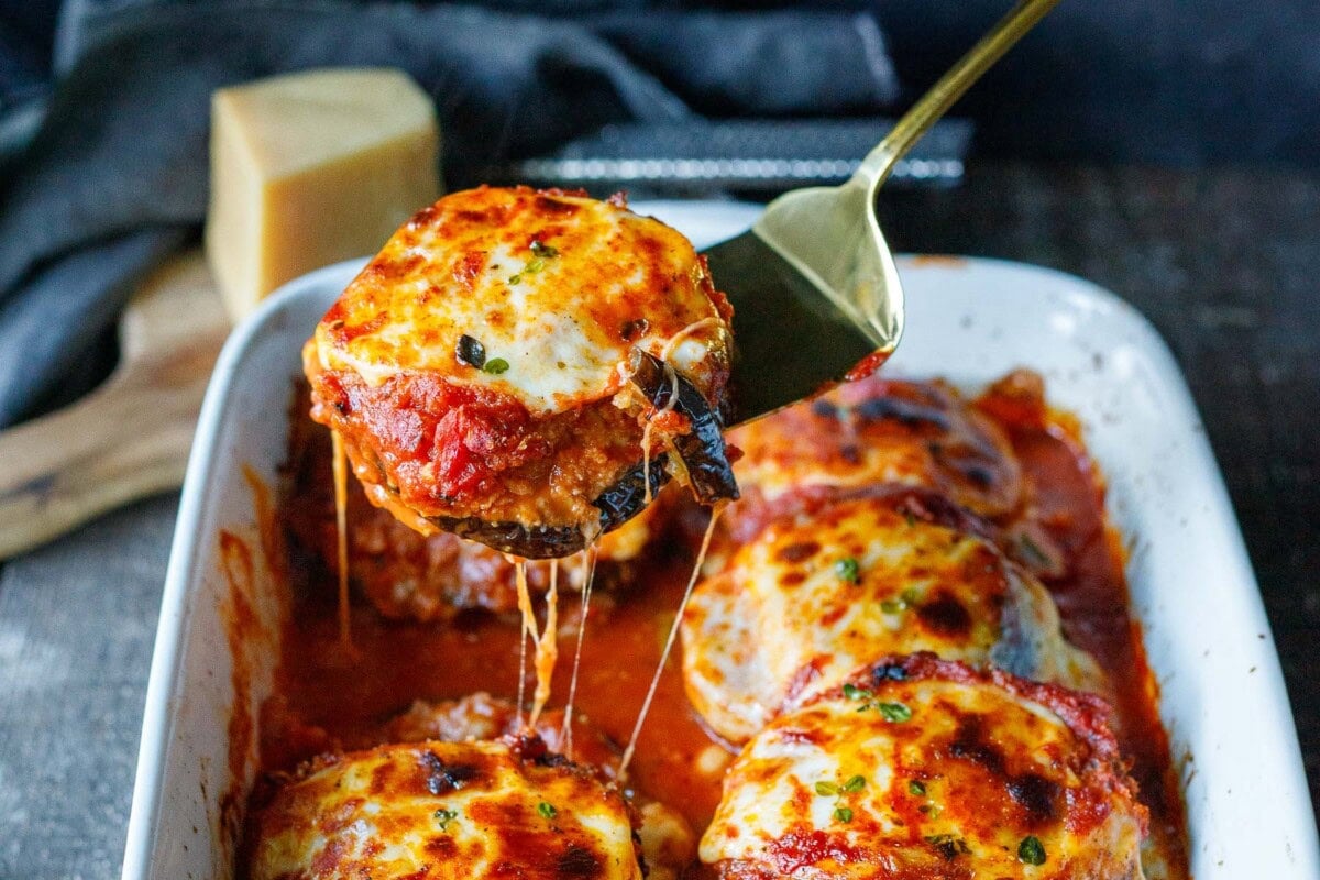 Eggplant Parmesan oven-baked,  with golden panko-crusted eggplant, rich marinara, and layers of melty cheese.
