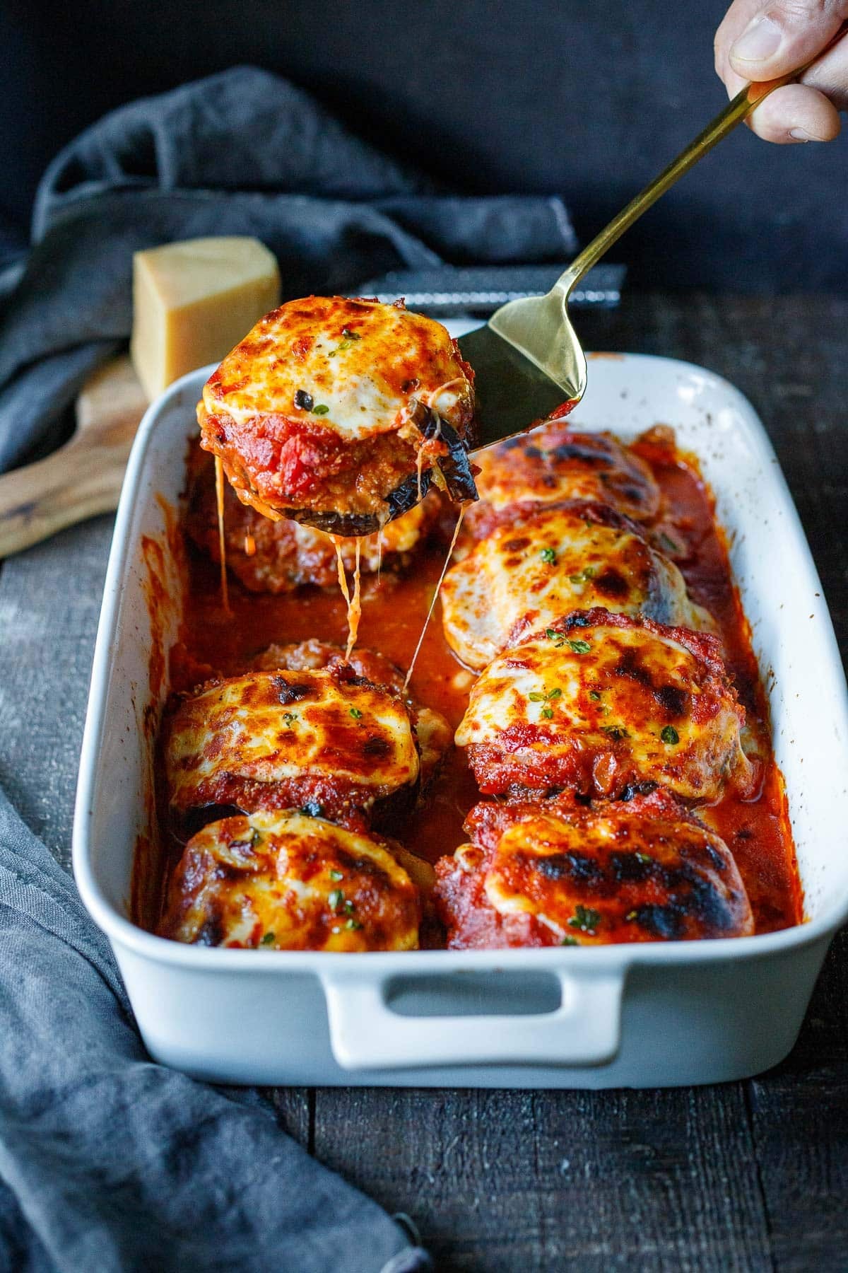 This Crispy Baked Eggplant Parmesan has golden panko-crusted eggplant layered with marinara, Parmesan, basil, and melty mozzarella. All the crunch, no frying!