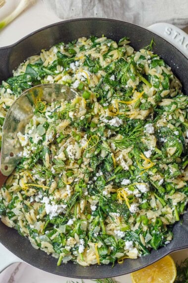 This easy Spanakopita Orzo is a creamy one-pan dinner with tender orzo pasta, spinach, feta, fresh dill, and lemon. All the flavors of spanakopita, ready in about 30 minutes!