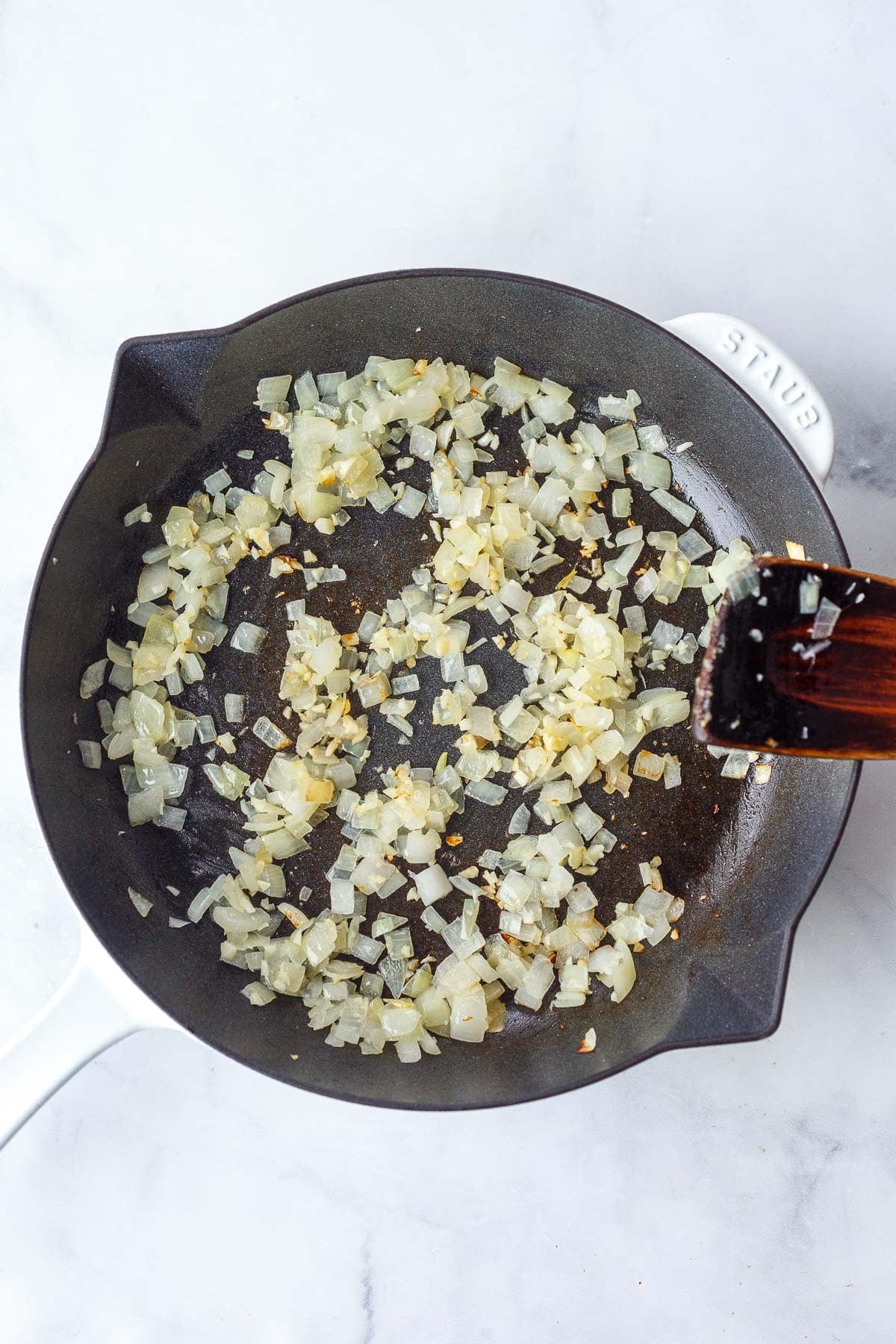 sautéed onions and garlic in a skillet.